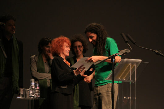 27 March - Award ceremony. René Ballesteros receives the Joris Ivens Award for his film LA QUEMADURA from Marceline Loridan-Ivens © Marion Saltel