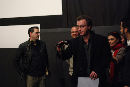 15 Mars - Cérémonie de Clôture. Palmarès. Prix des Bibliothèques : PODUL DE FLORI de Thomas Ciulei. Remis par le Jury des Bibliothèques : Julien Farenc, Thierry Maillot, Dominique Rousselet et Vincent Martorana © Nicolas Rapin
